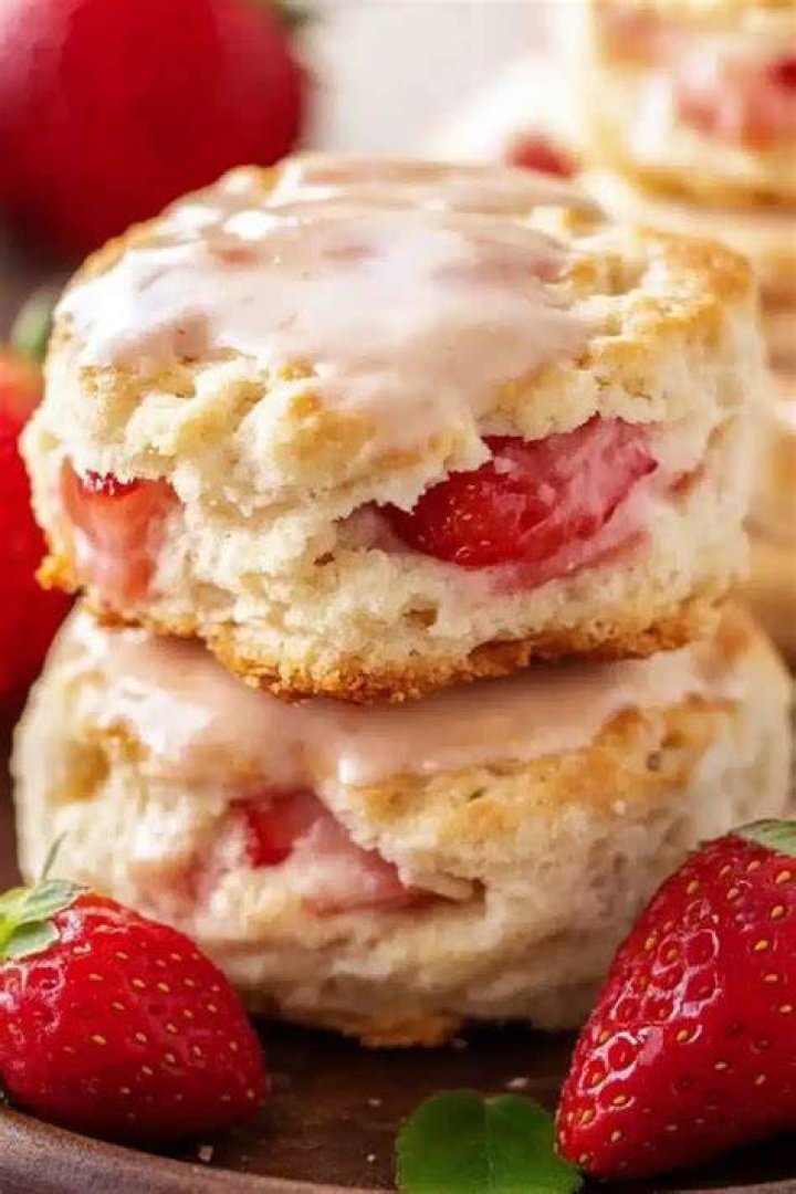 Closeup of strawberry biscuits on parchment paper